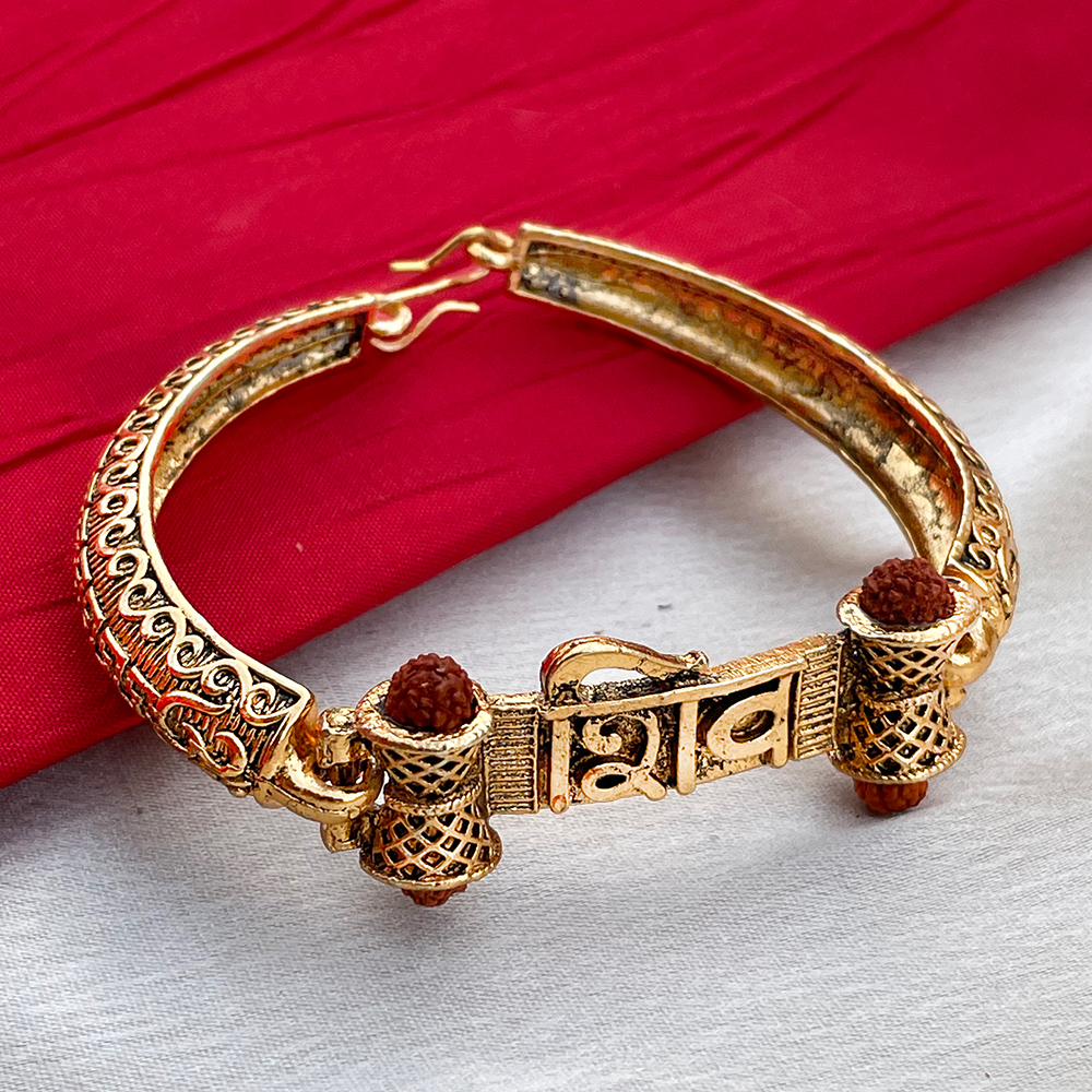 Designer OM Golden Bracelet Bhaiya Rakhi  Online Beautiful Center Piece  Bhaiya Rakhi Delivery in Jaipur India